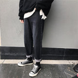 Loose Fit Cuffed Jeans