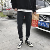 Loose Fit Cuffed Jeans