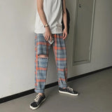 Distressed Plaid Trousers