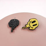 Melted happy face earring