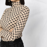 M Monogram Turtleneck Top