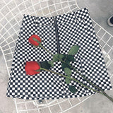 CHECKERBOARD ZIP MINI SKIRT