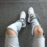 Cut Light Wash Jeans