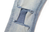 Cut Light Wash Jeans