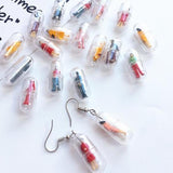 Human Capsule Earrings