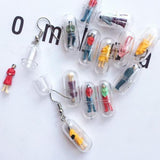 Human Capsule Earrings