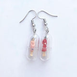 Human Capsule Earrings