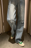 High Waisted Embroidered Smiley Knee Jeans