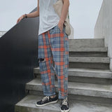 Distressed Plaid Trousers