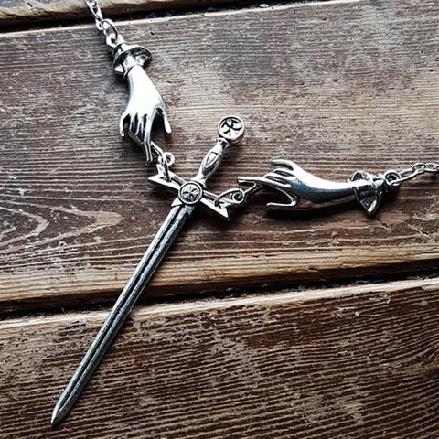 Hand With Sword Necklace