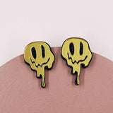 Melted happy face earring
