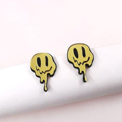 Melted happy face earring