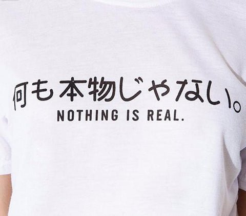 NOTHING IS REAL' TEE